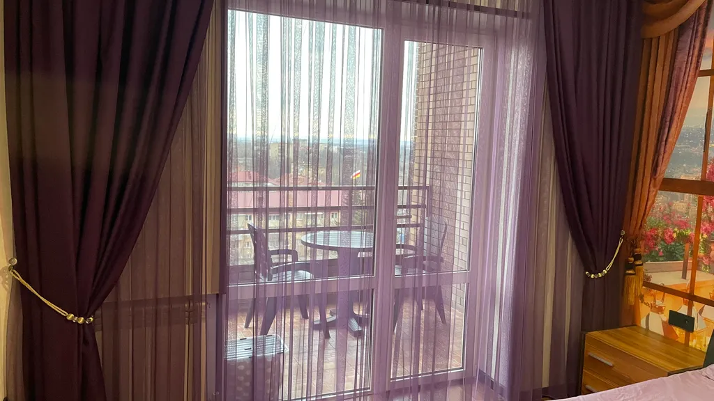 Уютная квартира с видом на город и горы