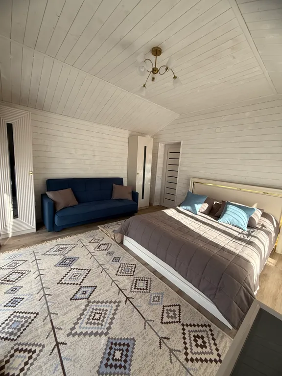 Дом в лесу с видом на горы