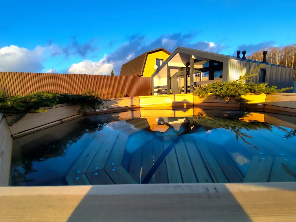 Уютный дом на две семьи в коттеджном поселке