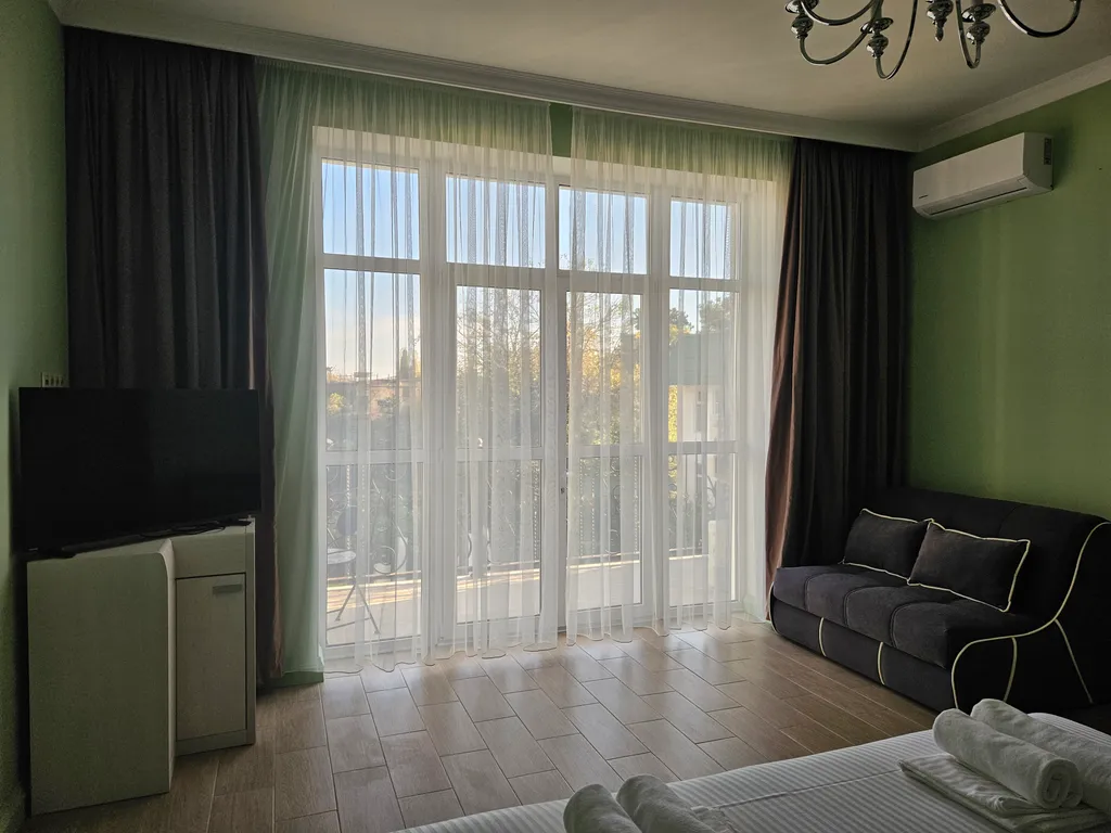 Апартаменты в  отеле Атлас