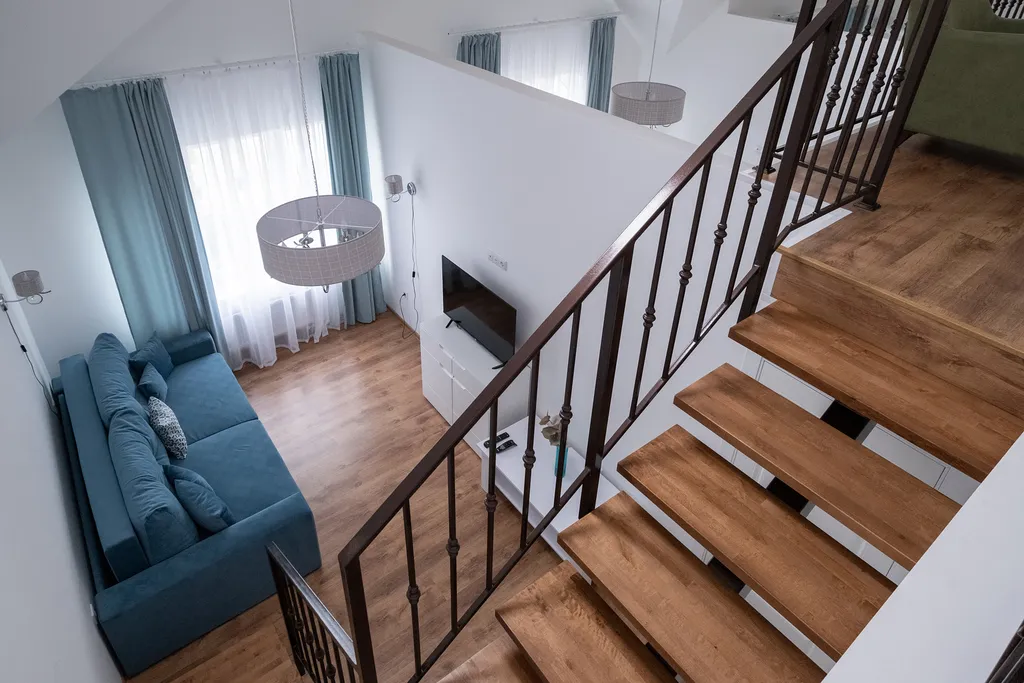 Трёхкомнатные двухуровневые апартаменты 163