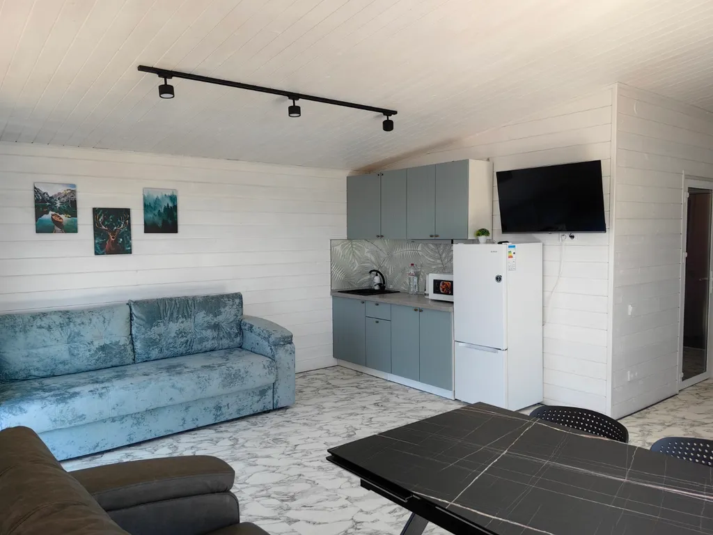 Дом на берегу озера с сауной и купелью