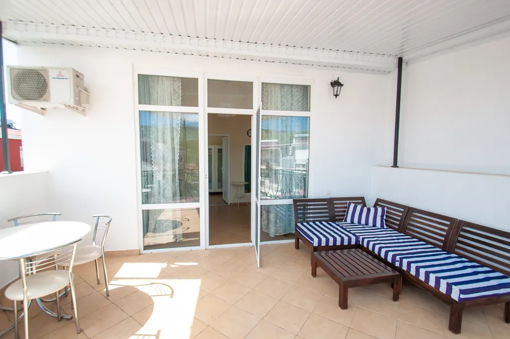 Апартаменты с террасой и боковым видом на море астра 5