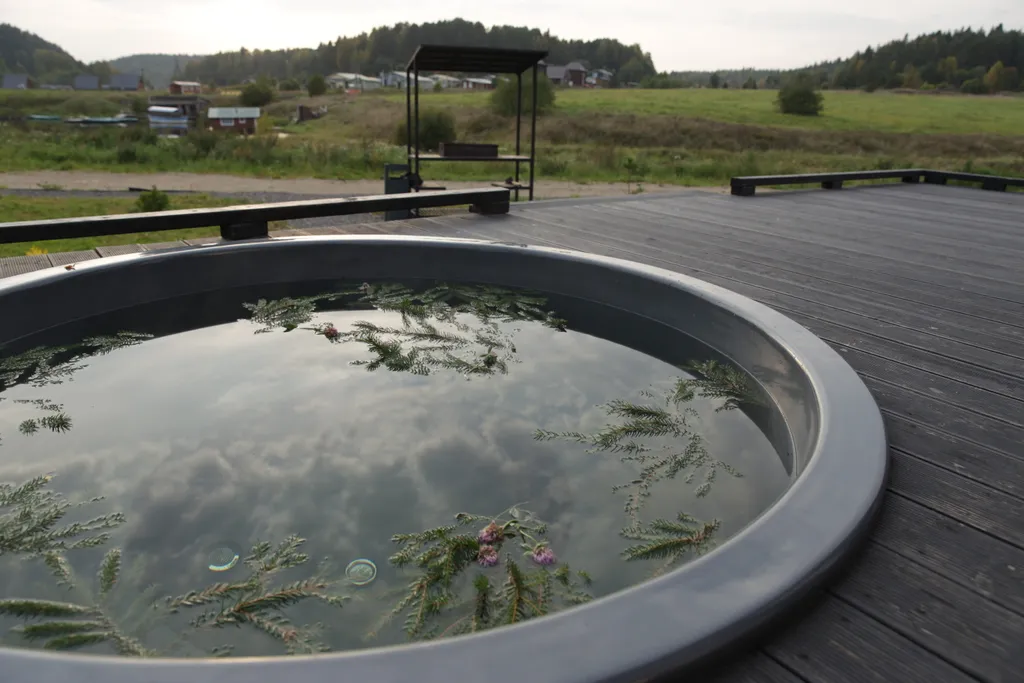 Дом Афрейм с подогреваемой купелью в террасе дома Лисичкино Карелия