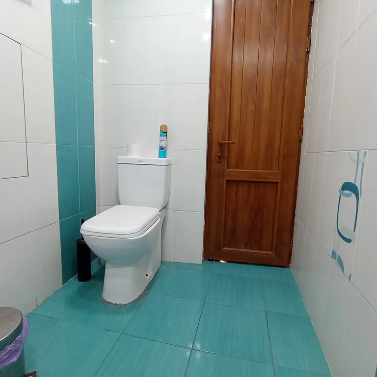 Уютный гостевой дом с частными комнатами и общим санузлом