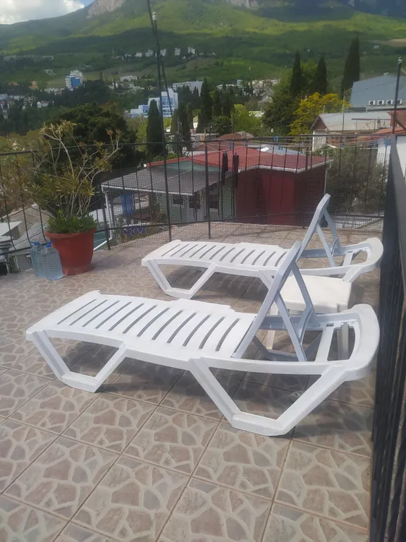 Летний домик с индивидуальной площадкой на крыше