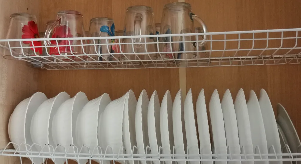 Уютный загородный дом с красивой благоустроенной территорией.