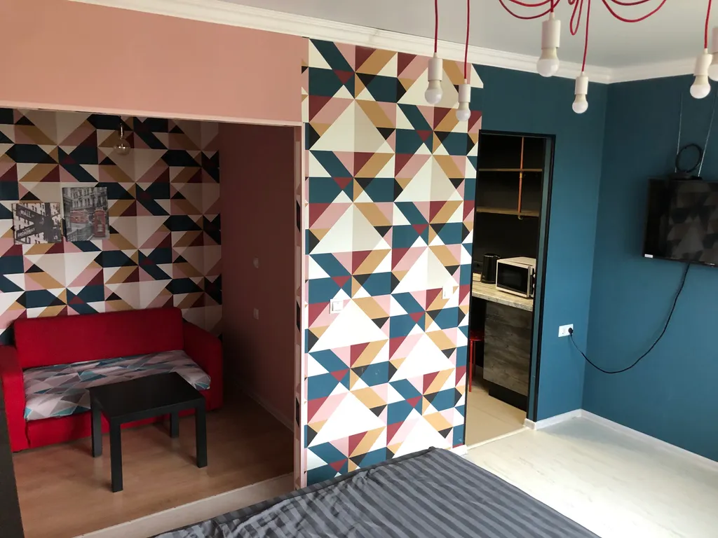 Студия с дизайнерским ремонтом