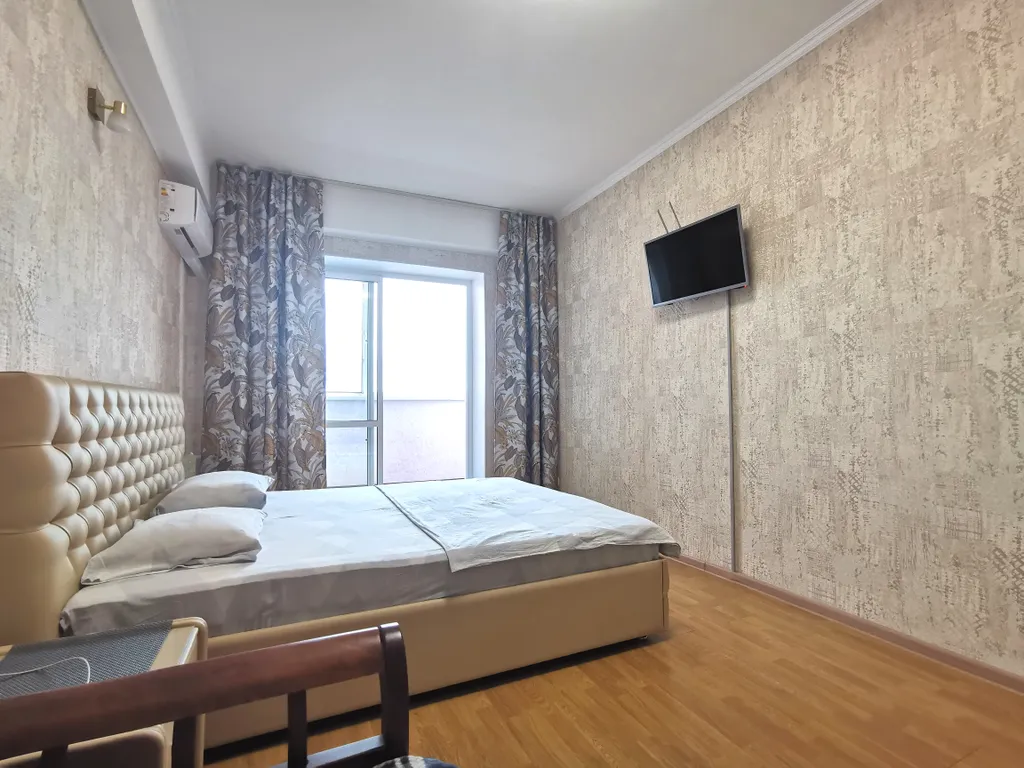 Солнечная квартира с видом на город