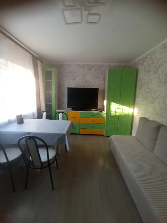 Квартира со своим двориком и стоянкой