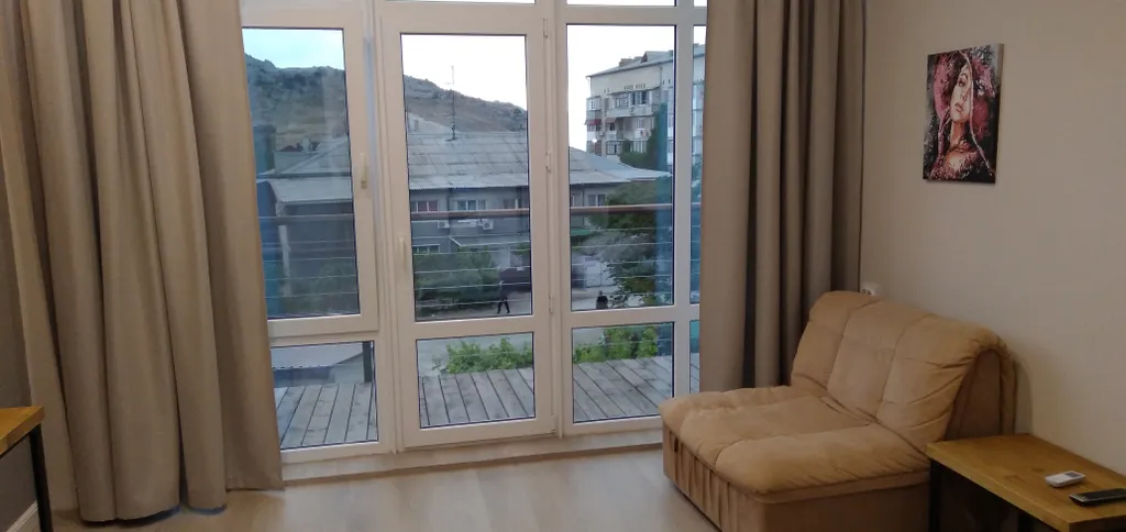 Апартаменты с видом на Генуэзскую крепость