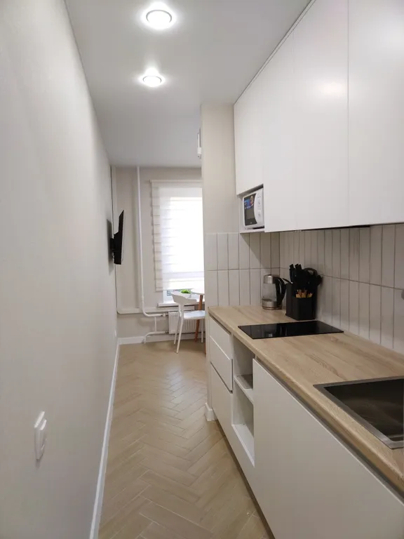 Уютная студия в новом доме с современным ремонтом