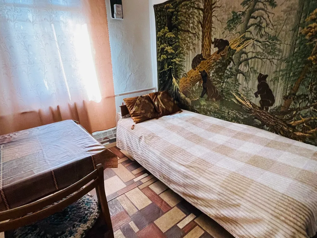 Дом с парковкой во дворе