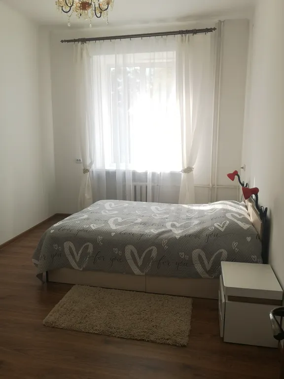 Уютная и теплая квартира в центре города с садом во дворе