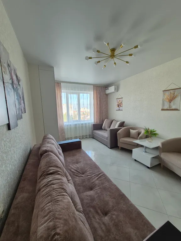 Уютная светлая квартира с видом на город