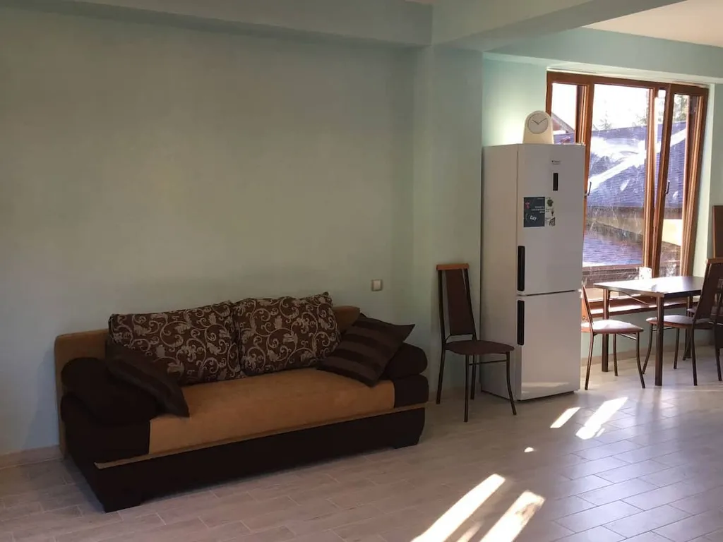 Панорамная студия с потрясающим видом на горы в центре красной поляны