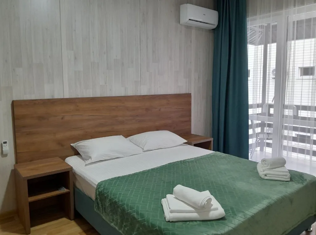 Четырехместный двухкомнатный номер с балконом