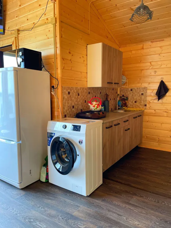 Коттедж Уютный домик на берегу озера Волго — Ланино