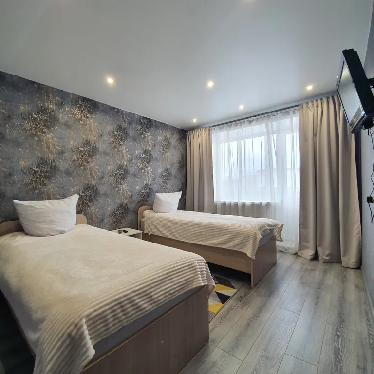 Уютная 2-комнатная квартира с раздельными спальнями в центре города