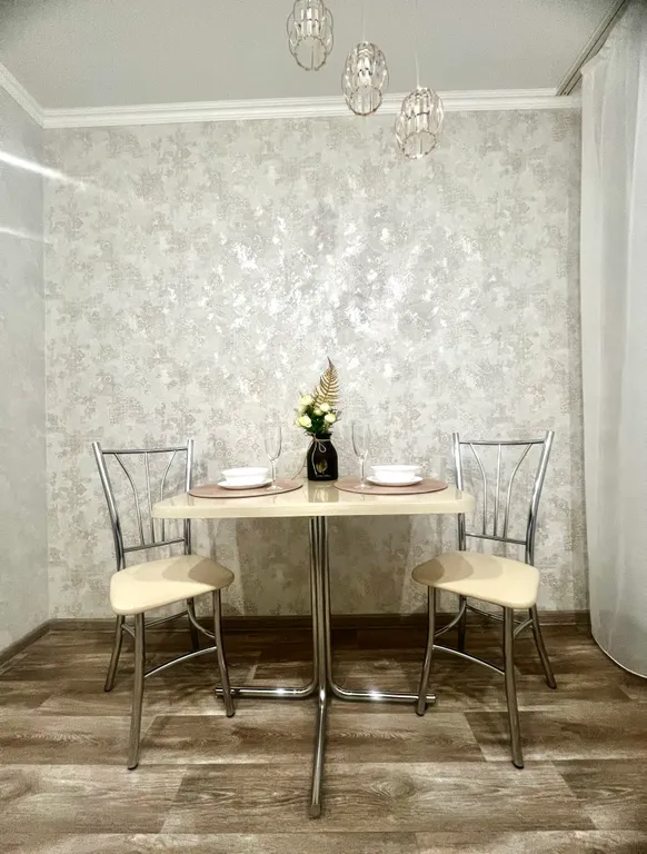 Шикарные апартаменты с белоснежными полотенцами и бельем