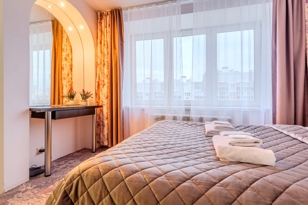 В тихом районе с удобной кроватью, гостиничный сервис, бесконтактно