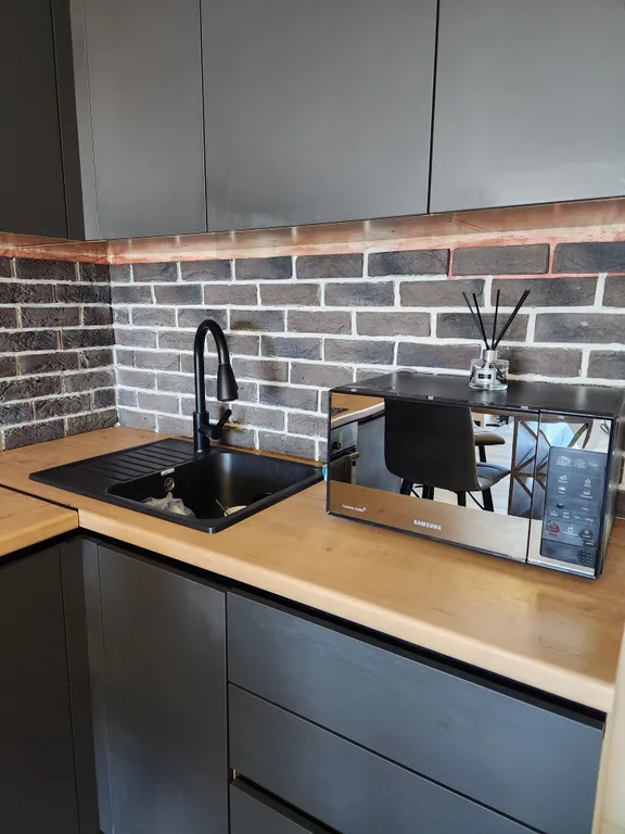 Уютная квартира в самом центре города с дизайнерским ремонтом