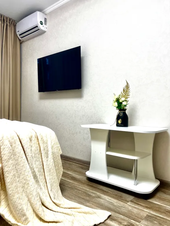 Шикарные апартаменты с белоснежными полотенцами и бельем