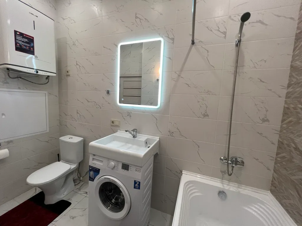 Стильная двухуровневая студия Лофт