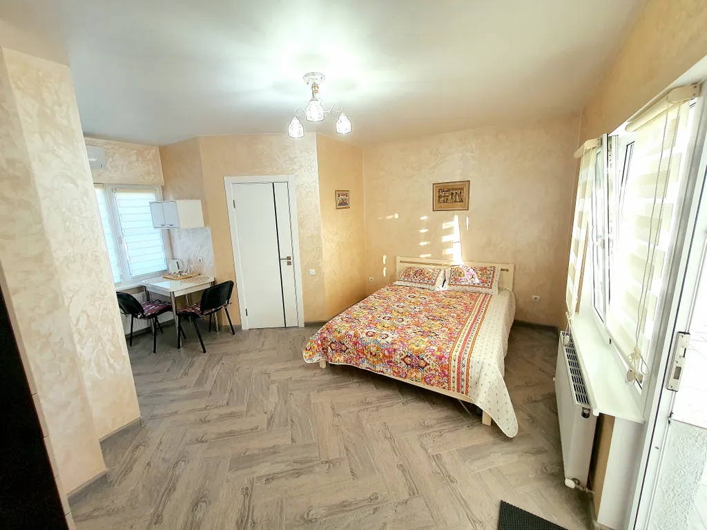 Комфортный номер с террасой и с видом на озеро