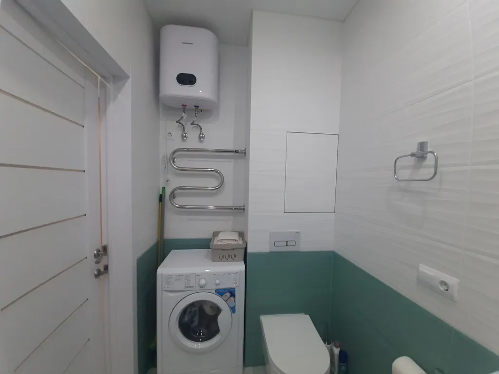 Уютная студия с видом на колесо обозрения