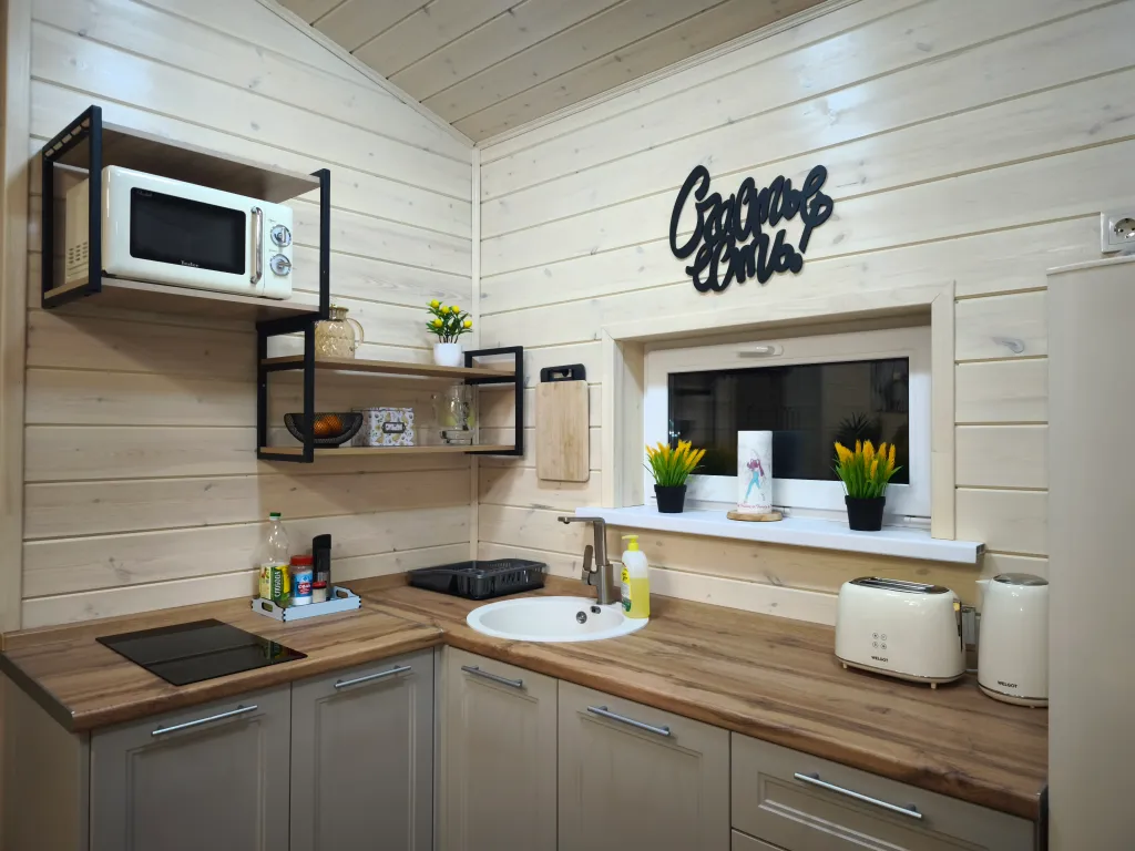 Дом шале с горячей купелью на террасе