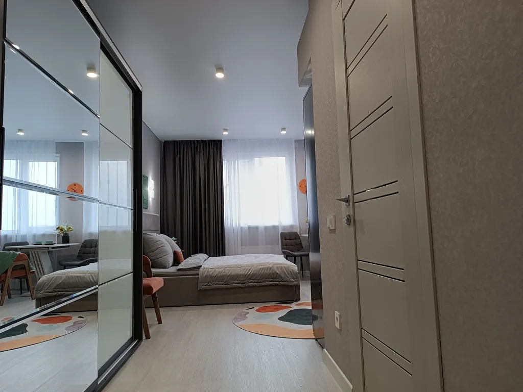 Просторная студия с 4-х местным размещением с видом на город