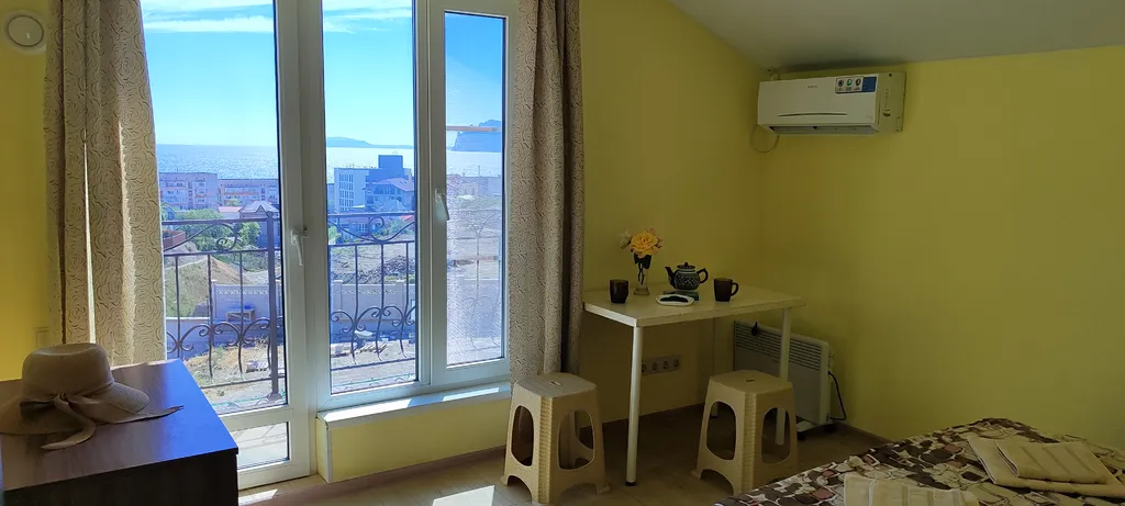 Апартаменты с балконами и панорамным видом на море и горы