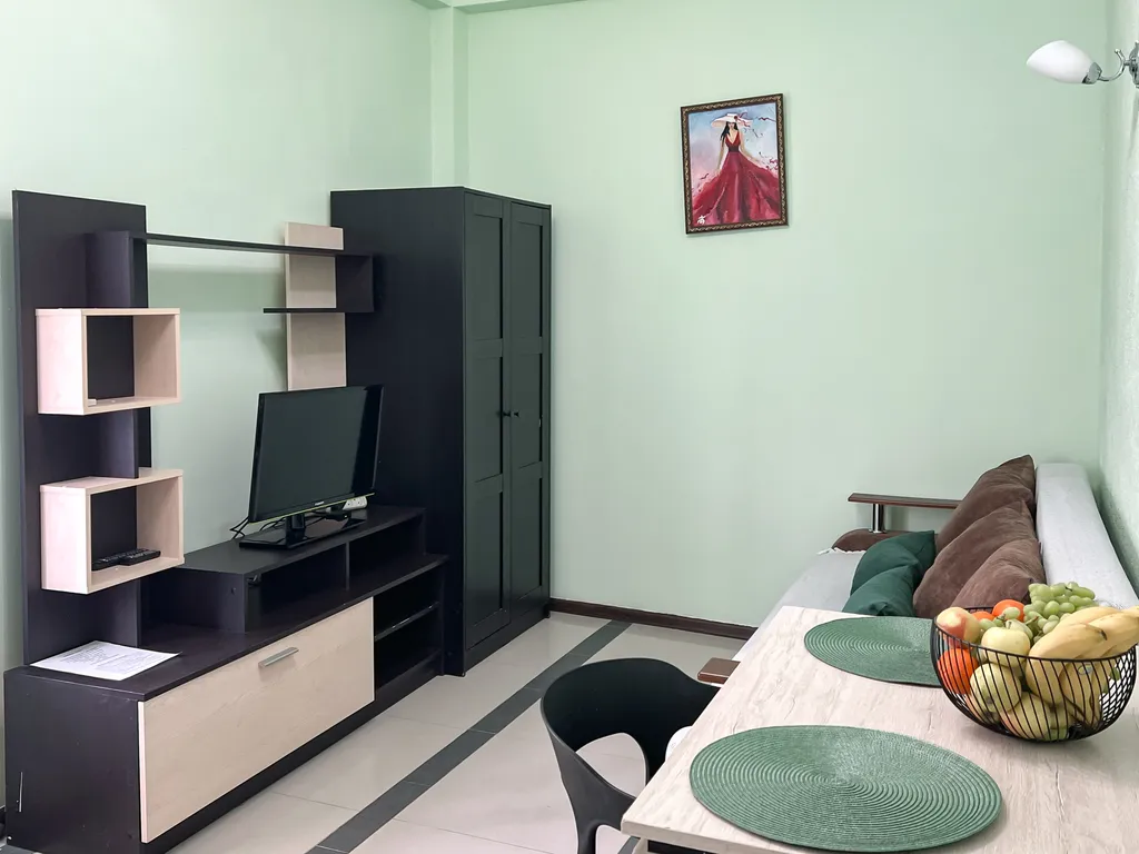 Семейный номер с кухней в центре