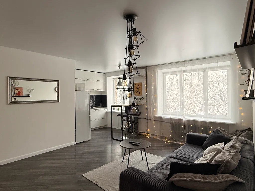 Уютная квартира-студия с отдельной спальней в самом центре города