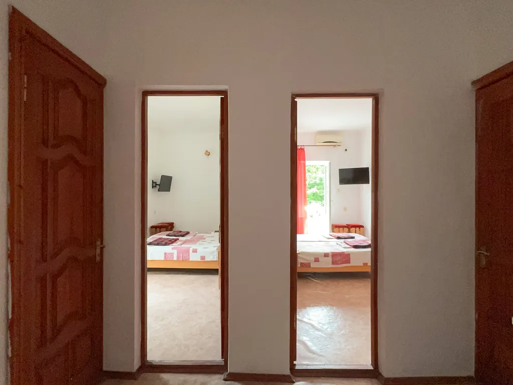 Четырехместный номер с 2 отдельными комнатами и балконами