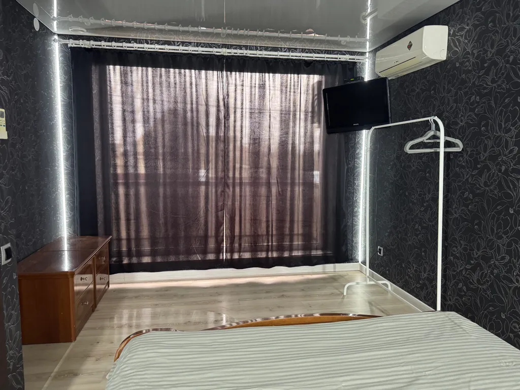 Фиолетовый дом