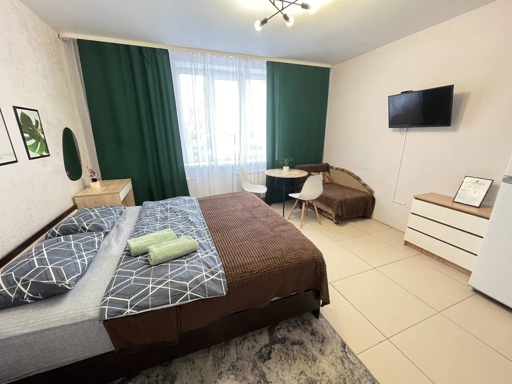 Уютные апартаменты около ТЦ Изумрудный город