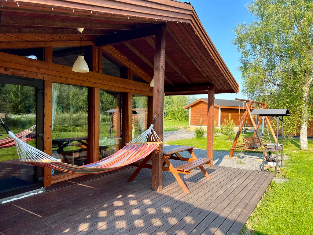 Коттедж с сауной и панорамным остеклением