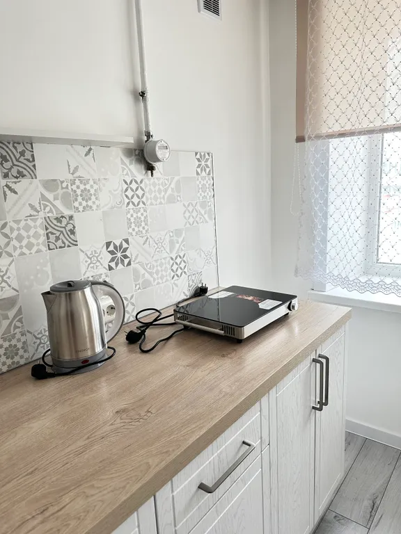 Уютная квартира в центре города, 2 комнаты, на первом этаже