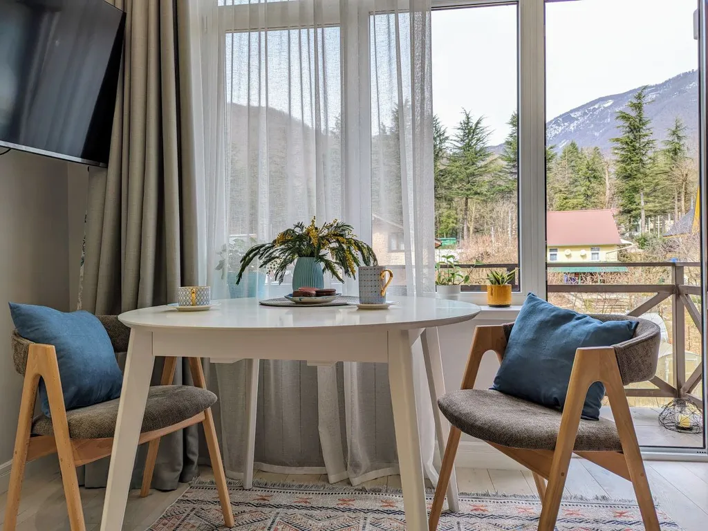 Двухуровневая квартира с балконом в центре