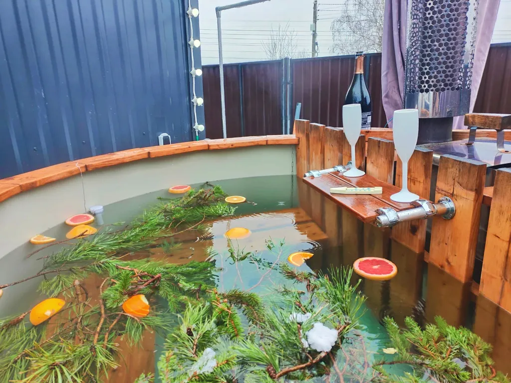 Дом с купелью и сауной, костровой зоной, мангалом и качелями