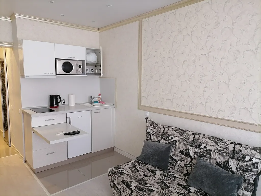 Резиденция на первой линии около Хилтона