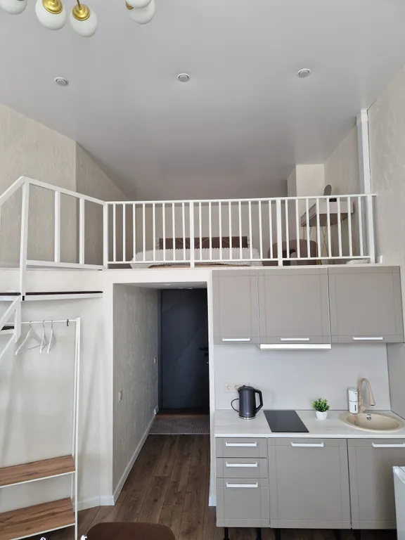 Уютная двухуровневая студия в центре