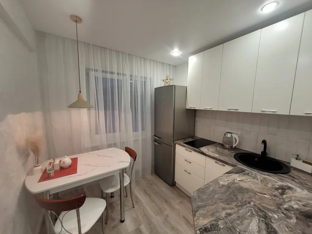 Уютная квартира с видом на заснеженные горы