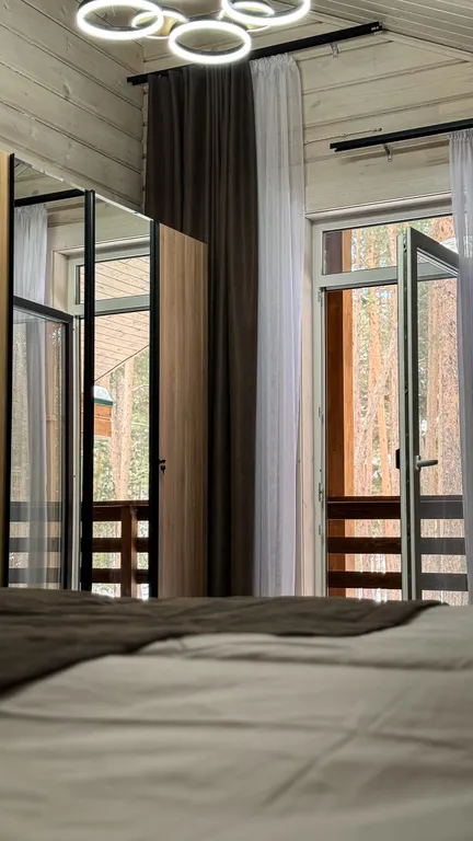 Двухэтажный коттедж в сосновом бору