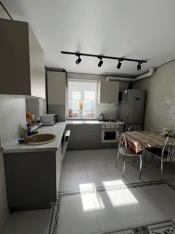 Уютный дом в черте города