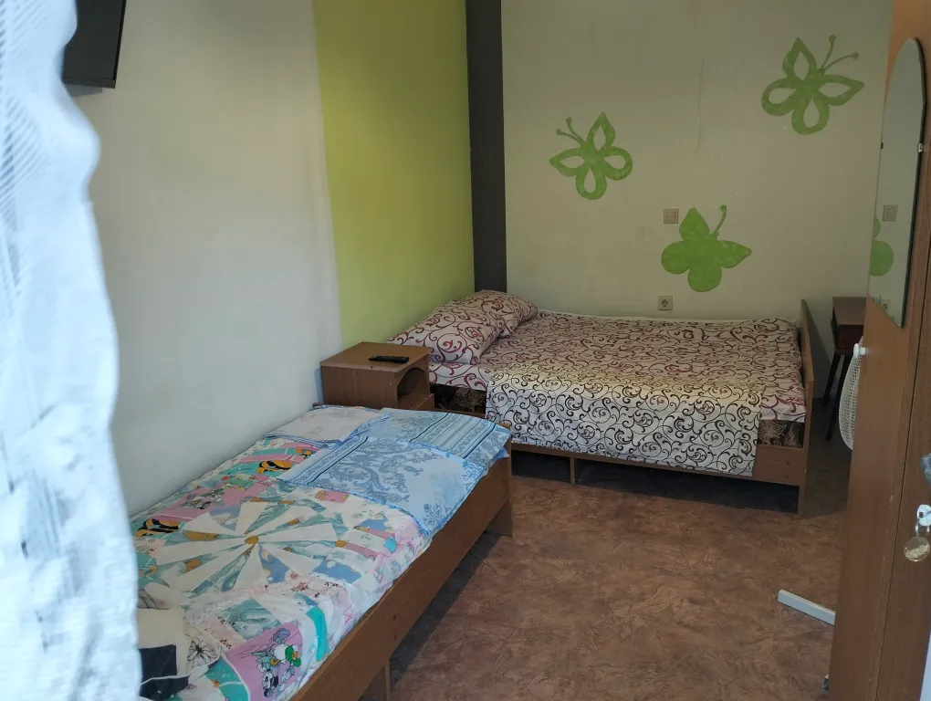 Комната-эконом с цветочным двориком в тихом районе