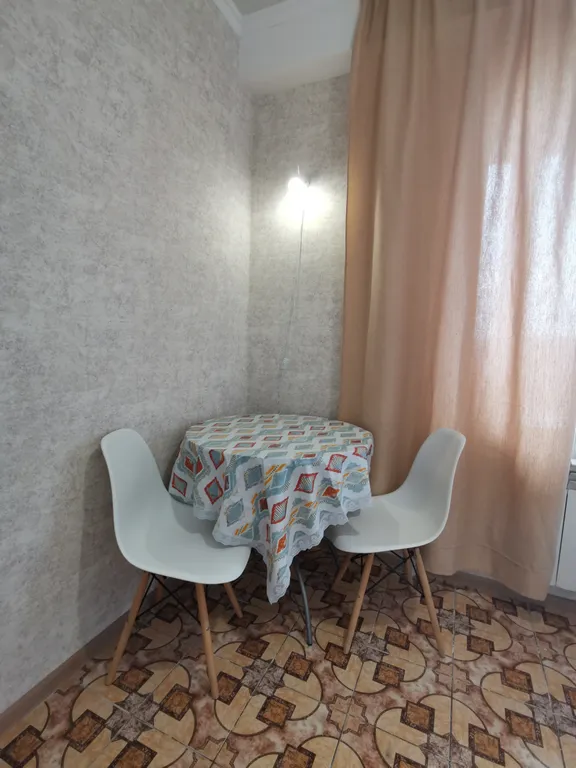 Солнечная квартира с видом на город