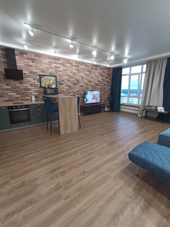 Стильная современная студия с дизайнерским ремонтом